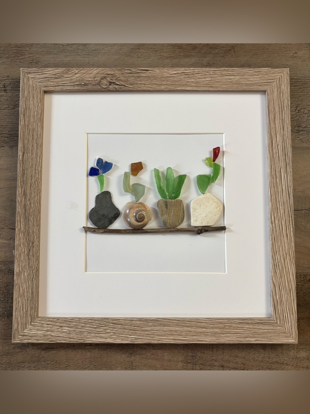 Handmade Decor 3D Framed 10”x10” artwork with beach glass, rocks, and findings